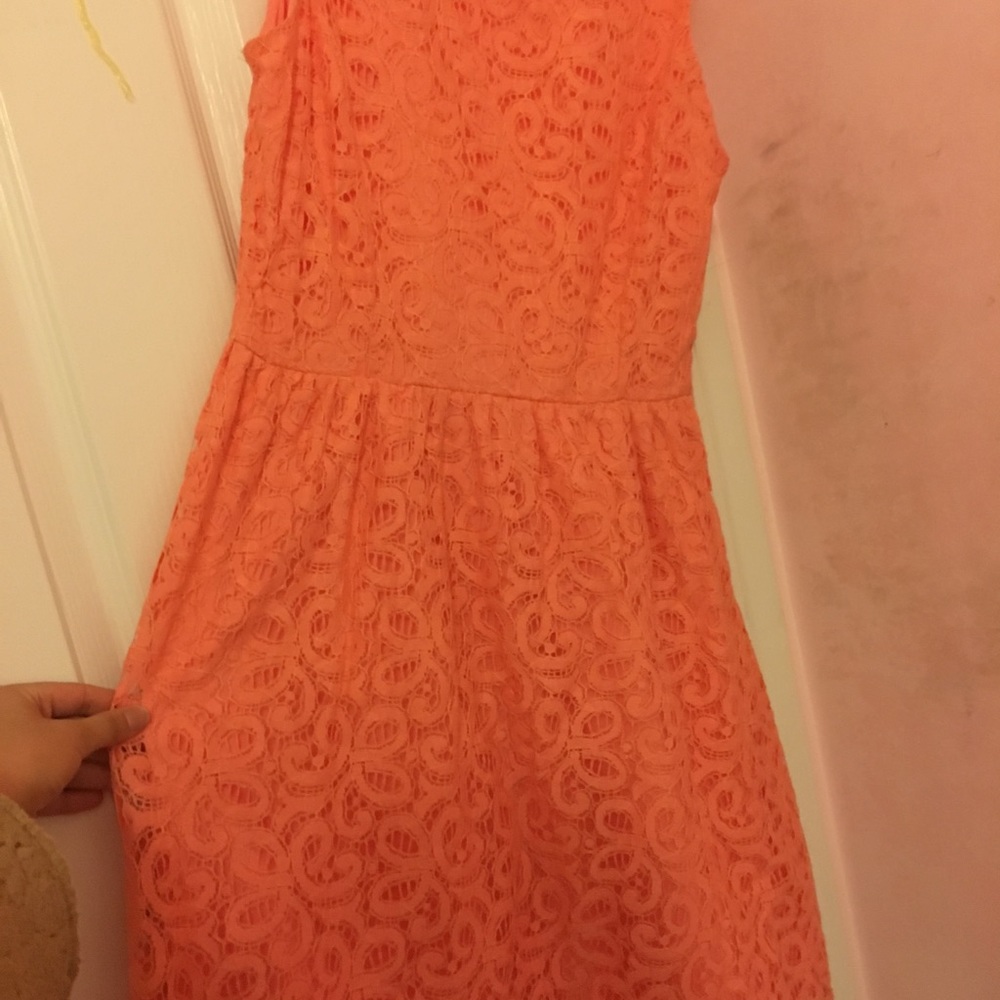 Orange coral colored lace dress.